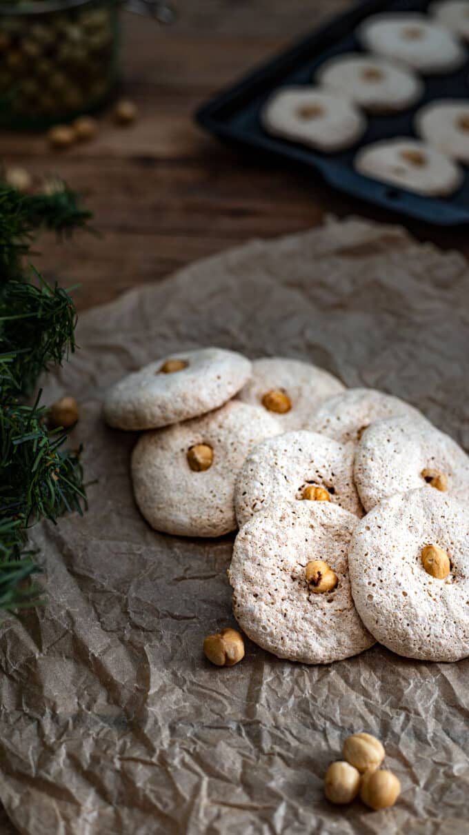 Close up of cookies on parchment paper.