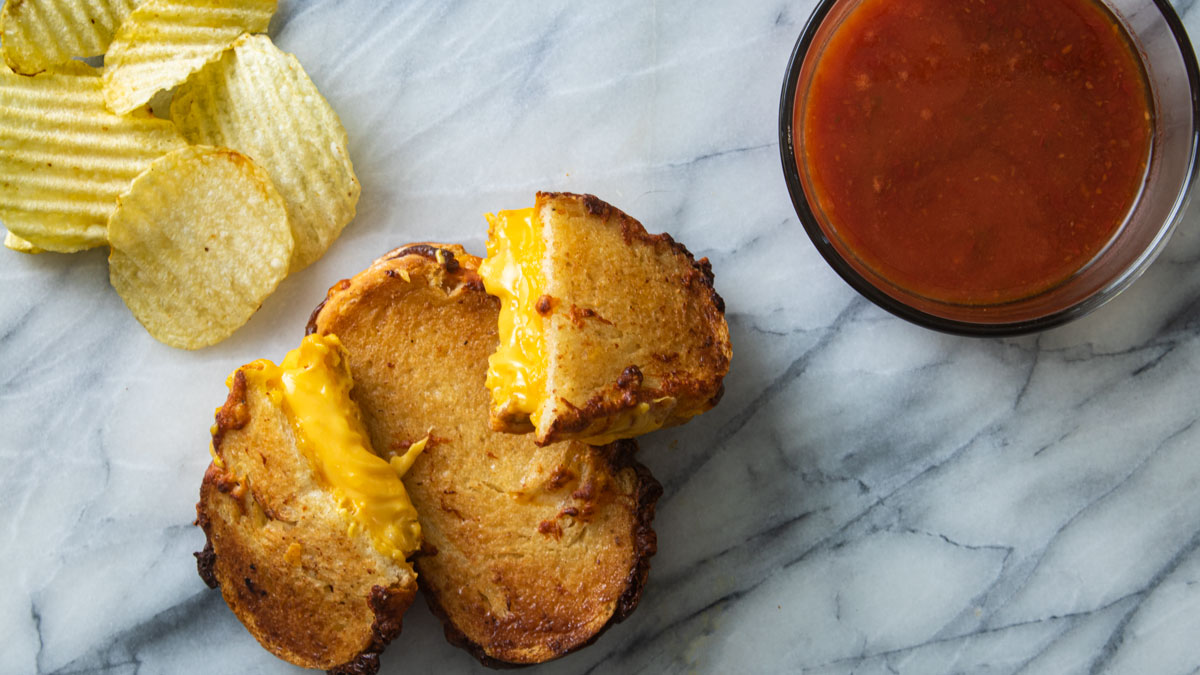 2 sandwiches with melted cheese.