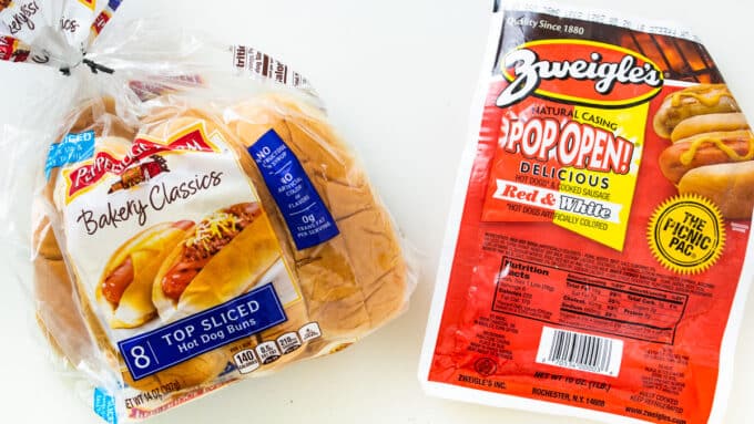 Ingredients to make them; hot dogs, rolls.