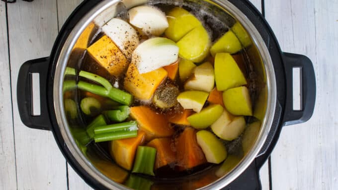Broth added to vegetables.
