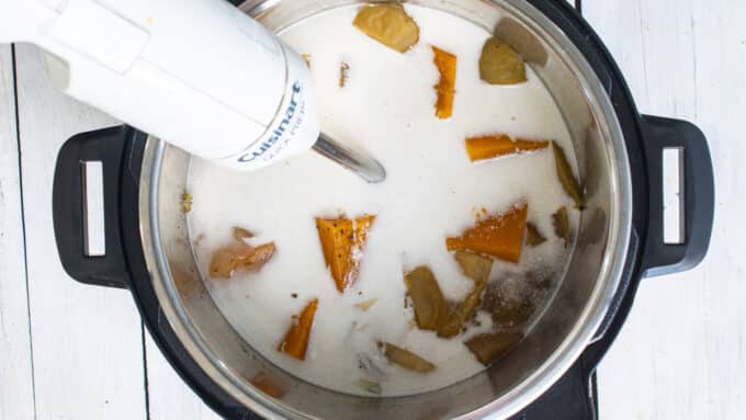 Coconut milk added to vegetables.