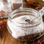 Salt in a canning jar with spoon.