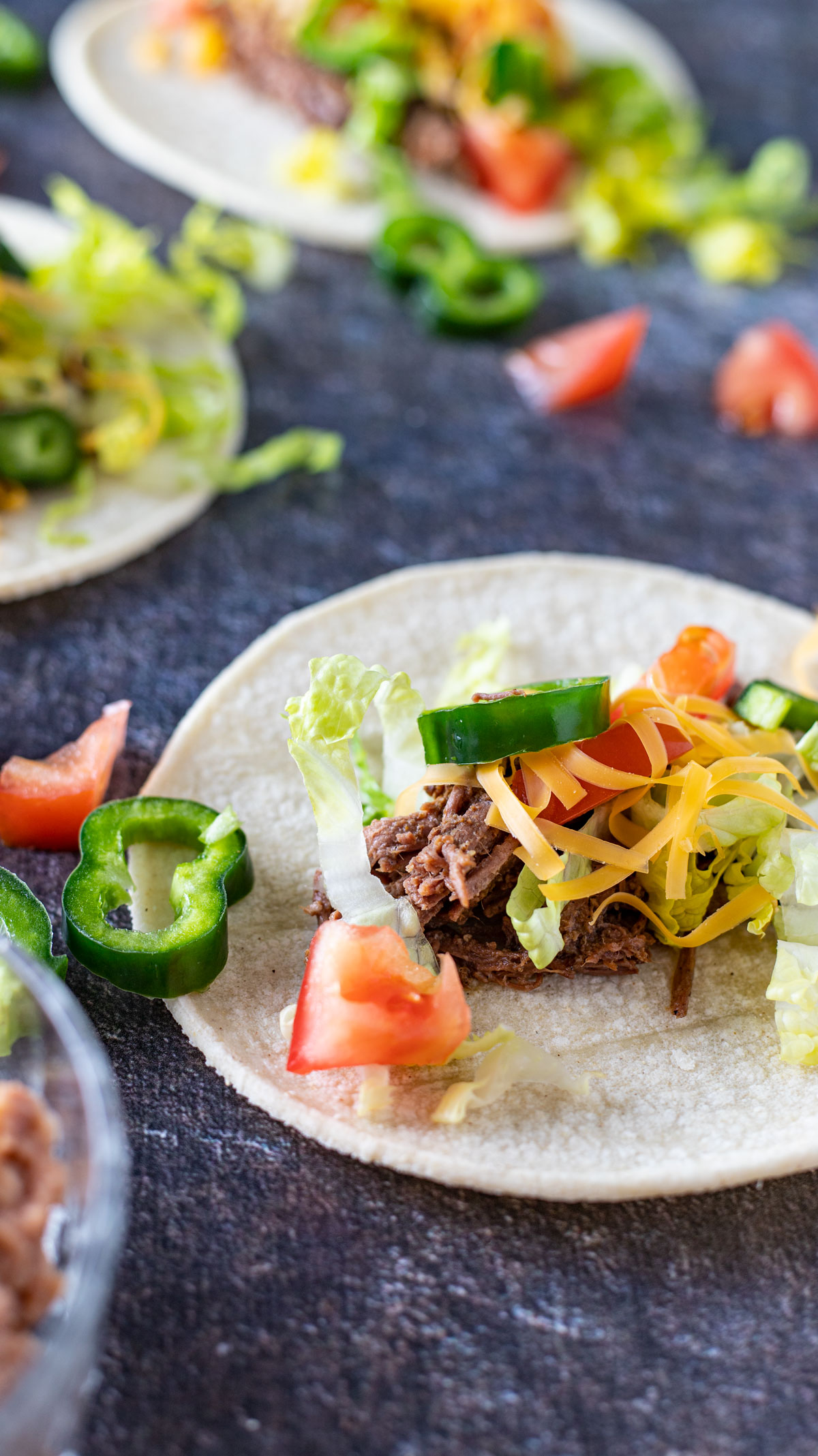 Close up of venison on tacos.