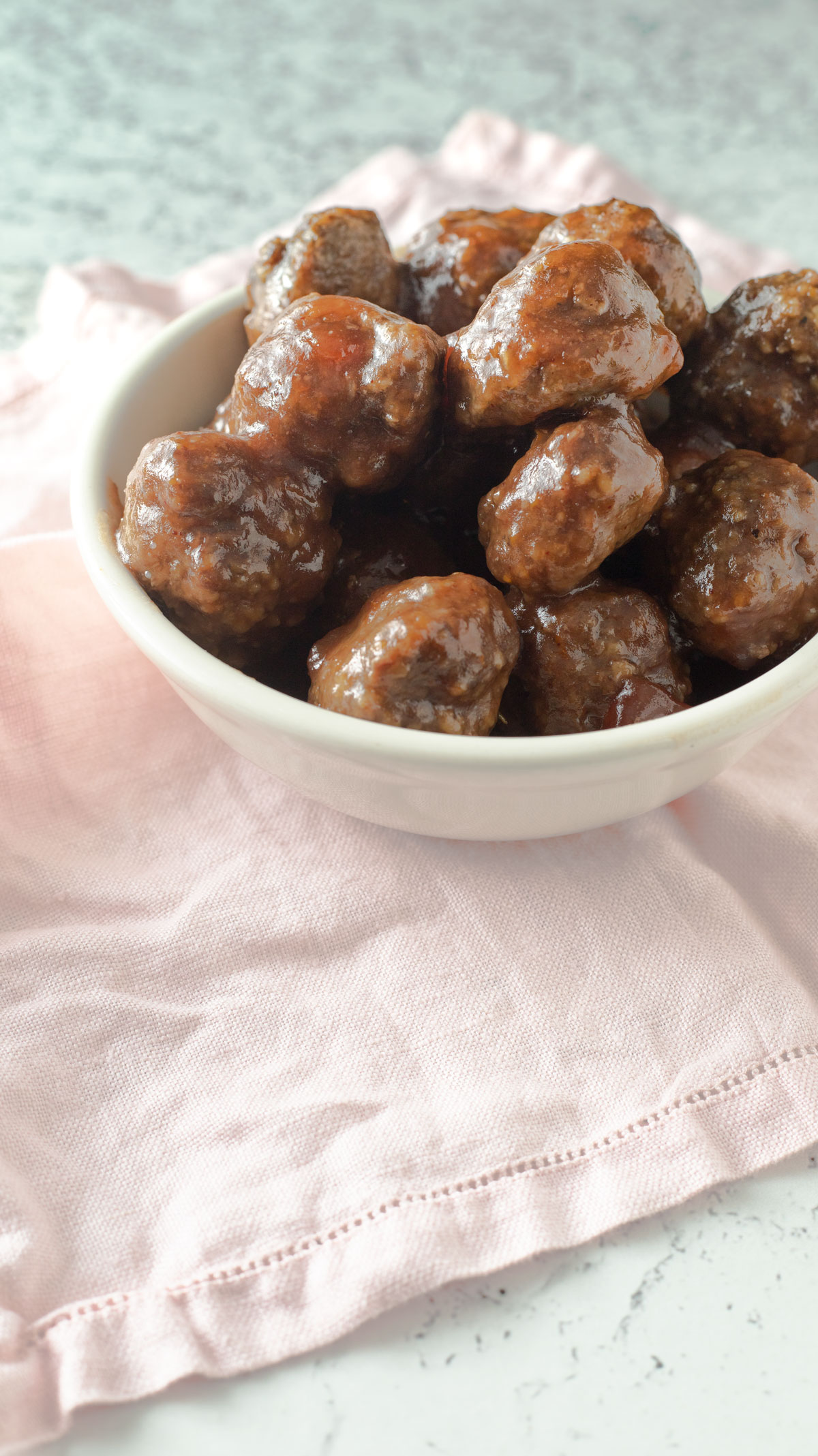 Bowl with cranberry meatballs.