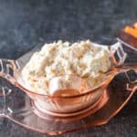Close up image of dip in antique pink bowl.