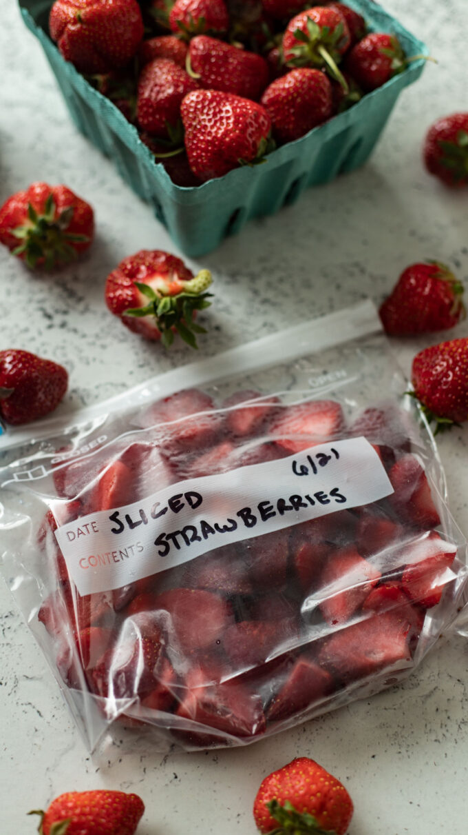 One bag filled with sliced frozen strawberries