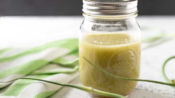 Green dressing in a canning jar.
