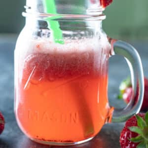 Close up of sparkling strawberry juice.