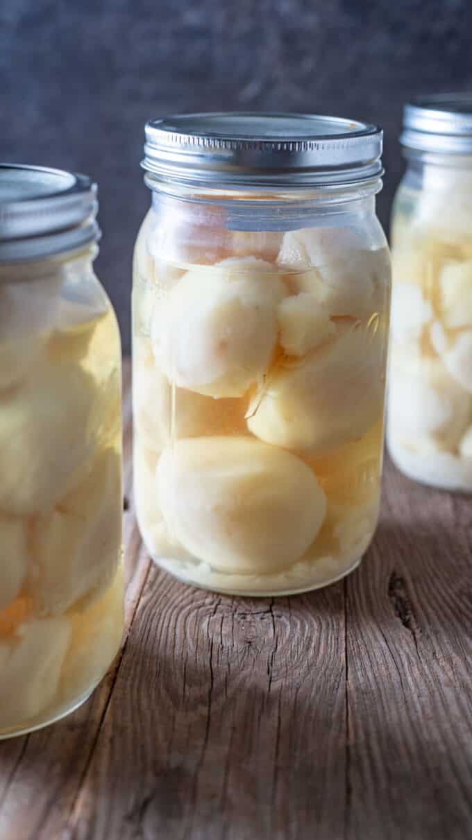 Three jars of whole potatoes.