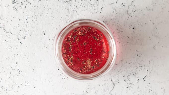 vinegar, honey salt and pepper added to jar.