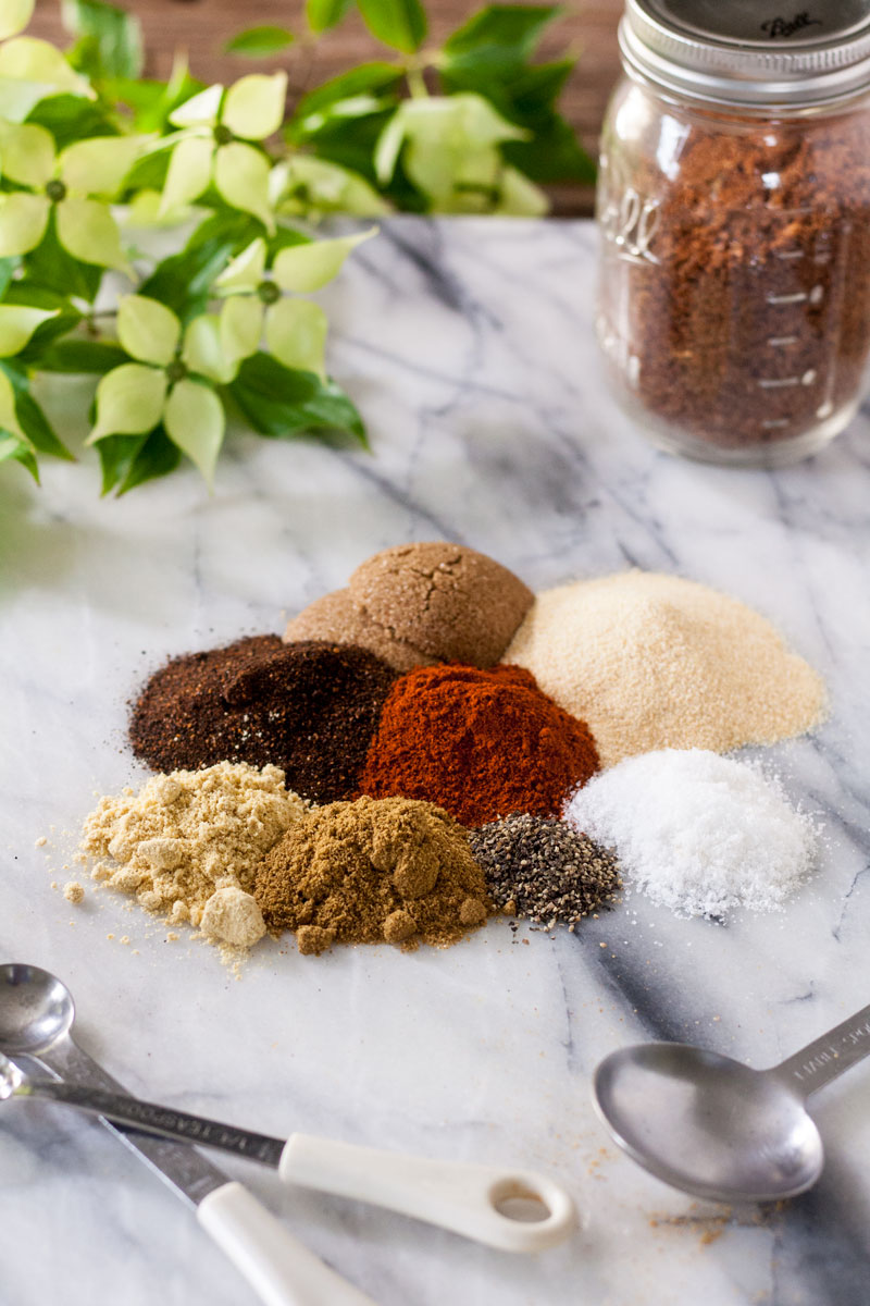 SPices for pork rub on a marble board.