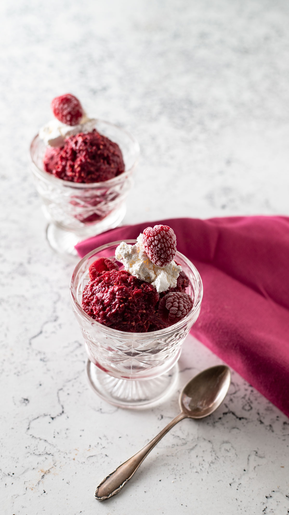 Bowls of sherbet with toppings.