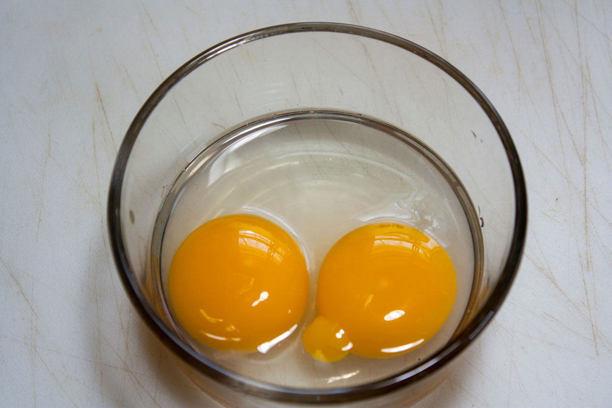 Two eggs in a small bowl.