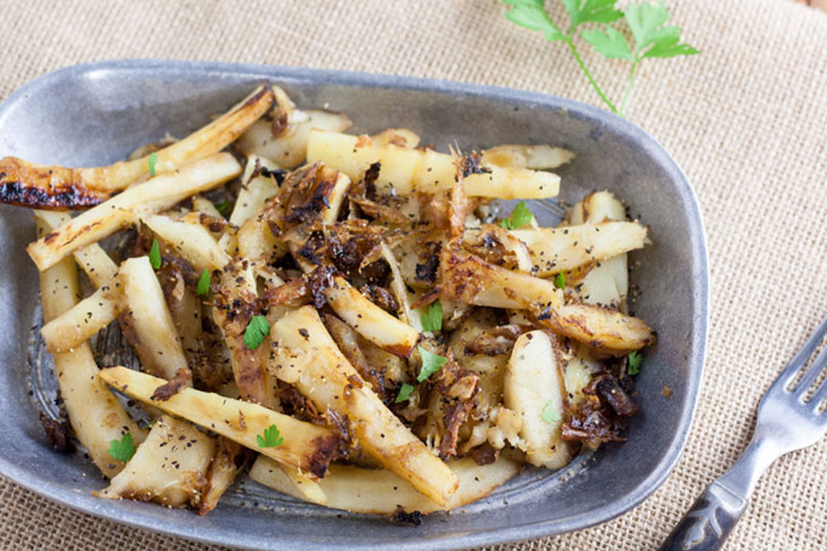 Holiday parsnip recipe served on metal dish.