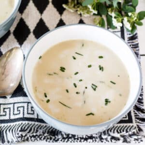 Asparagus soup in blue bowl.