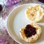 Blueberry jam on toasted English muffin.