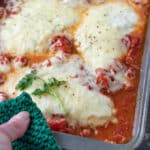 Chicken capri in a metal baking tray.
