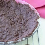 Chocolate wafer crust on pie dish.
