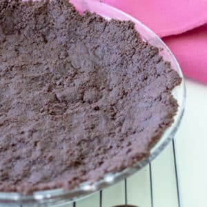Chocolate wafer crust on pie dish.