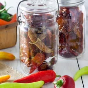 Dried peppers in antique canning jars.