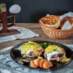 Eggs benedict smothered in Hollandaise sauce.