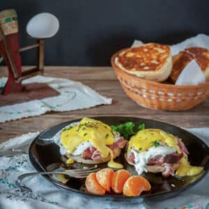 Eggs benedict smothered in Hollandaise sauce.