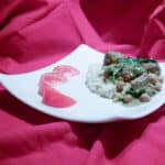 lamb coconut curry on white plate.