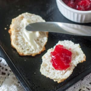 Plum jam spread onto homemade biscuits.