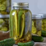 Sweet pickle spears in quart jar.