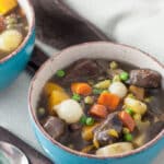 Venison stew in blue bowl.