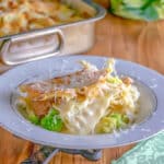 White lasagna with Romanesco in white bowl.