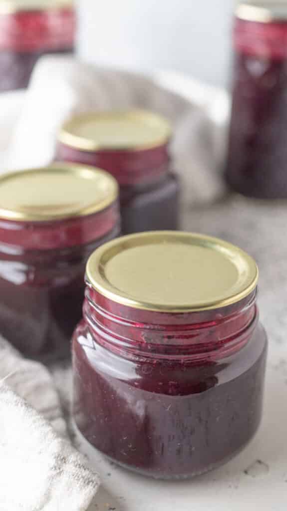 Overhead view of jars of syrup.