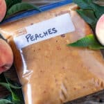 Close up of frozen peach purée in freezer bag.