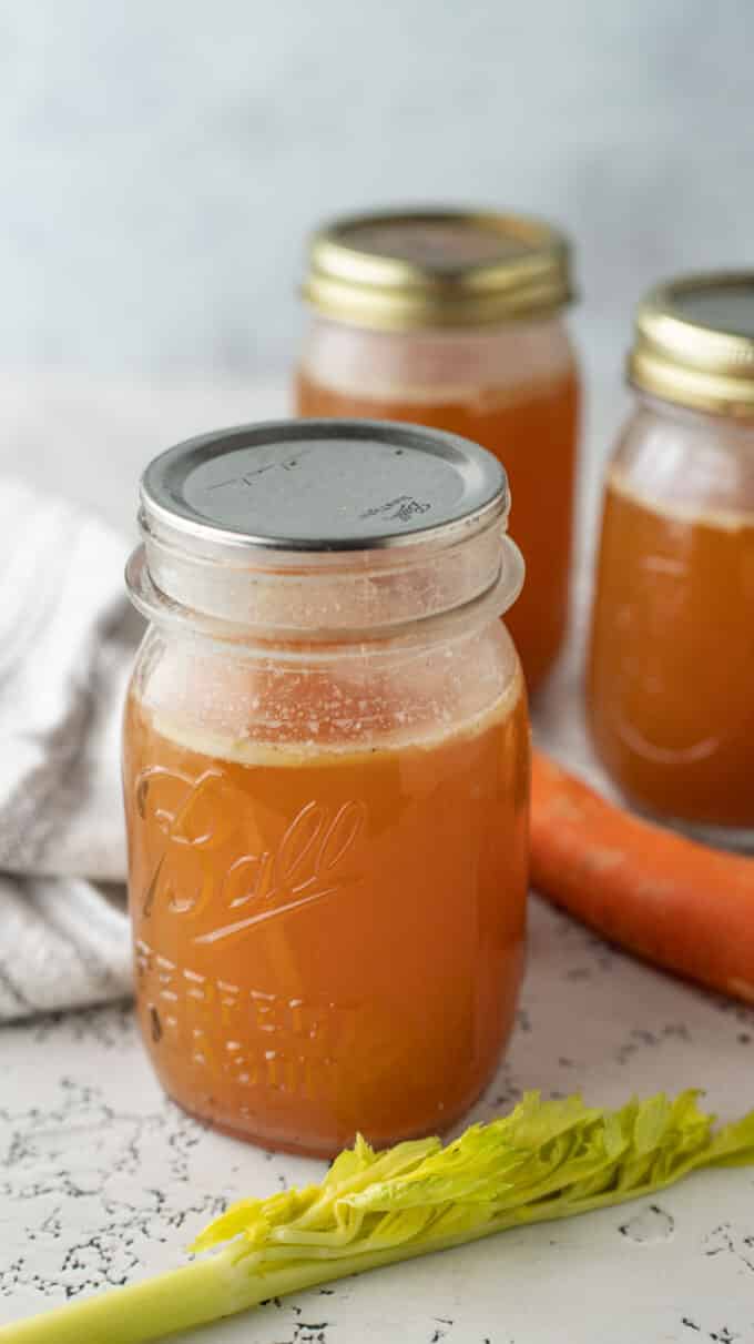 Light bone broth in pint canning jar.
