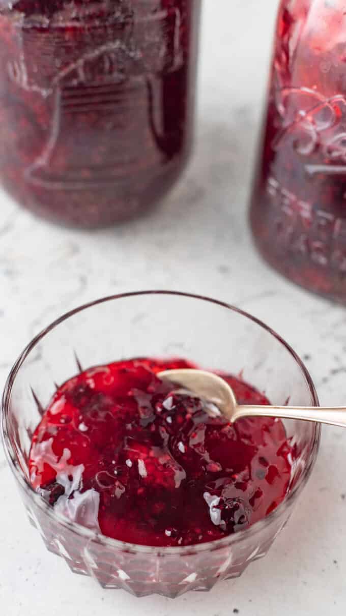 Spoon in bowl of pie filling.