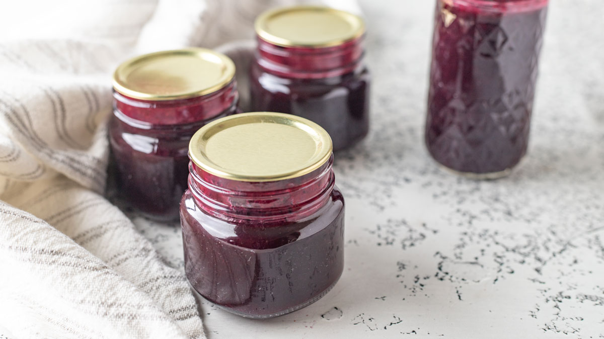 Canning jars full of syrup.