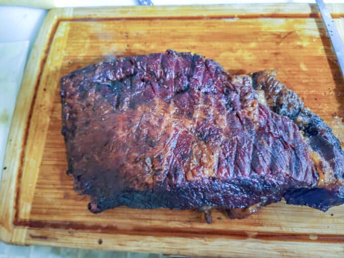 Meat resting on board.