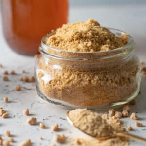 Close up of jar of maple sugar.