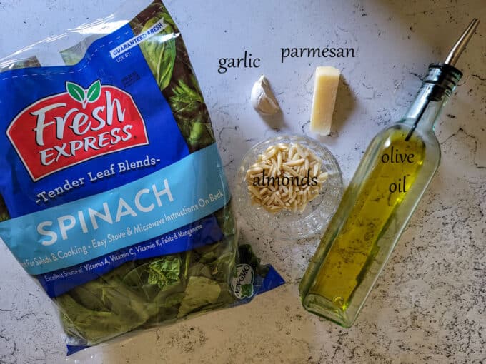 Ingredients for making spinach pesto. See details in recipe below.