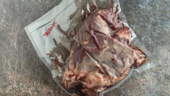 Thawed brisket in vacuum packing.