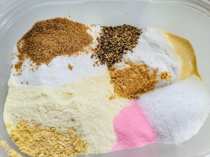 Add spices to a covered container.
