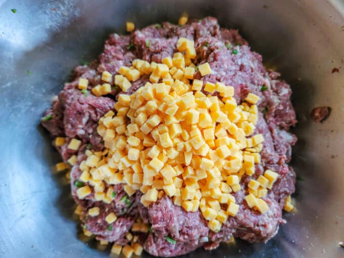 Cheese added to sausage mixture.
