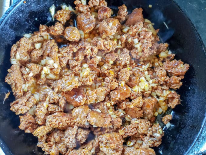 Browned sausage in skillet.