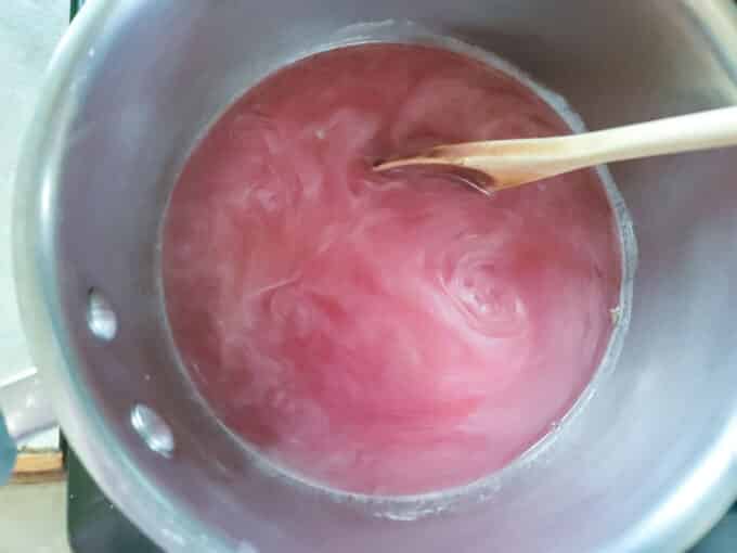 Pot with tea, pectin and lemon juice added.