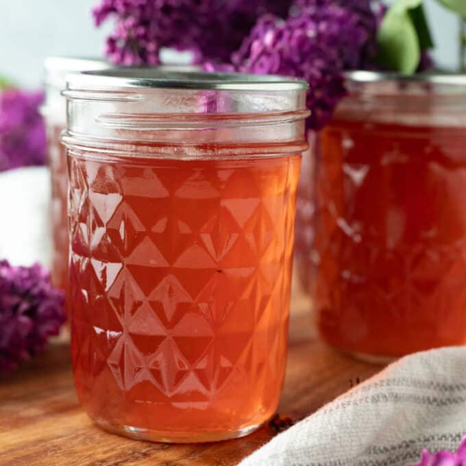 Close up of jars of lilac jam.