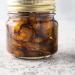 Jar of smoked oysters in oil.