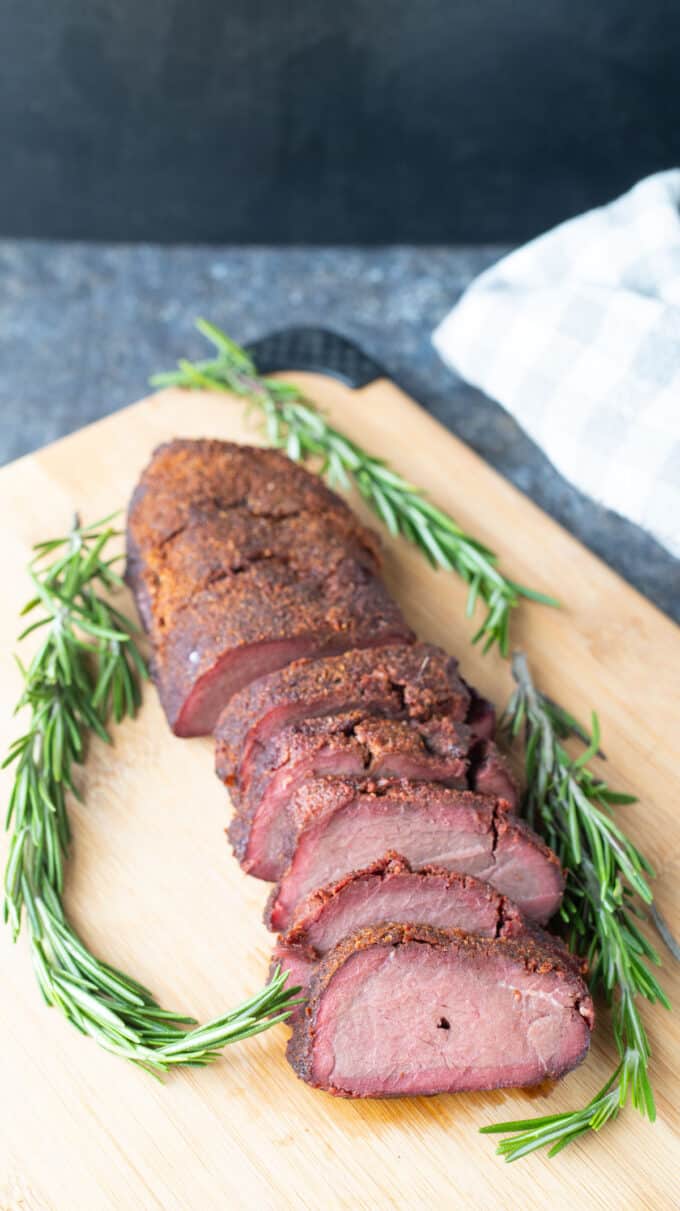 Sliced loin on cutting board.