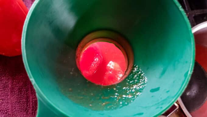 Filled jar with tomato juice added.