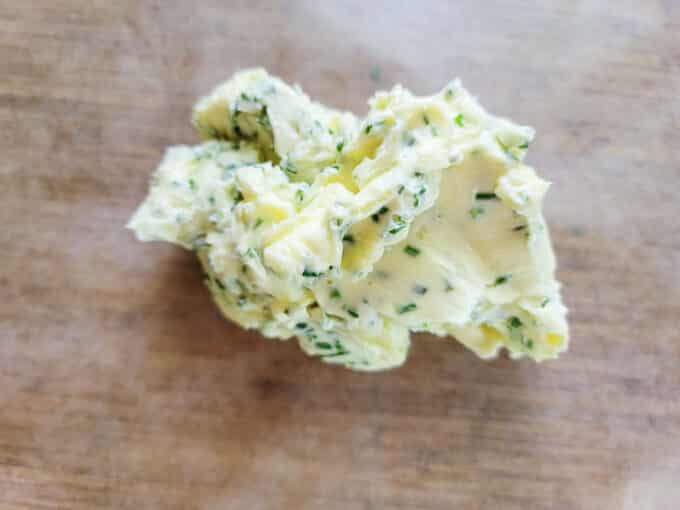 Spread the butter onto parchment paper.