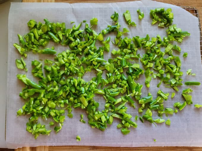 Chunks placed on parchment lined baking sheet.